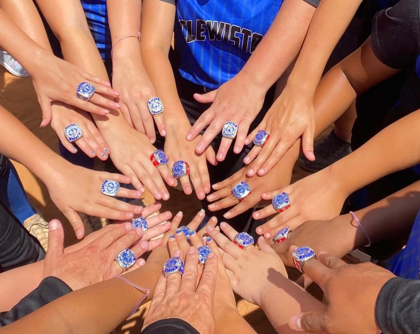 The Clewiston 12U All-Stars show off their championship rings.
